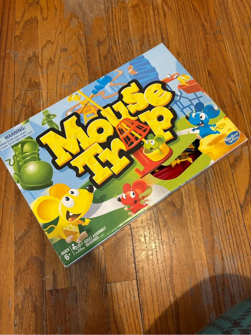 Hasbro Mouse Trap Board Game - Bright Yellow, Blue & Green Box